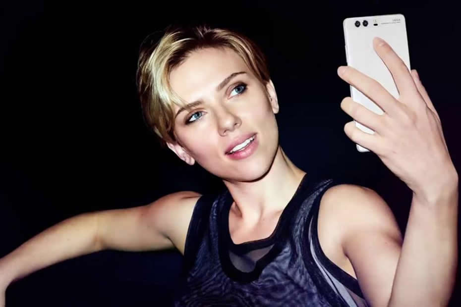 Scarlett Johansson striking a pose with her Huawei P9.